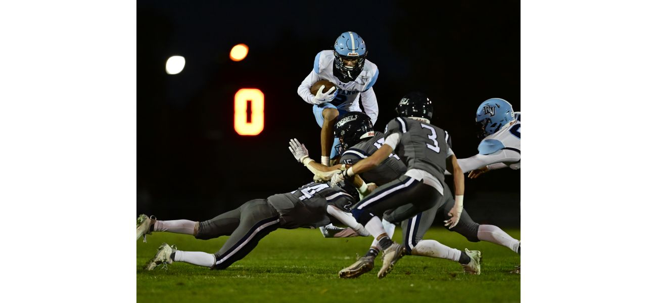 Ralston Valley beats Columbine in overtime, ending their 21-game winning streak with a goal line stand.