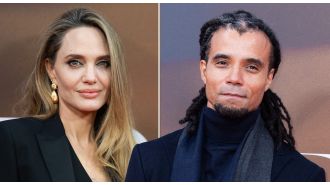 British rapper boyfriend accompanies Angelina Jolie to premiere.