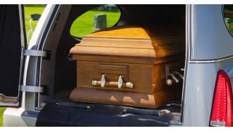 Funeral home is sorry for corpse falling into traffic from hearse.