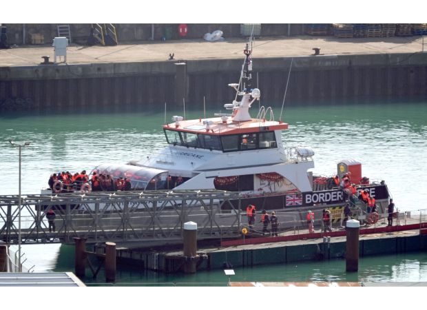 Father of infant who drowned in English channel claims she fell from his grasp.