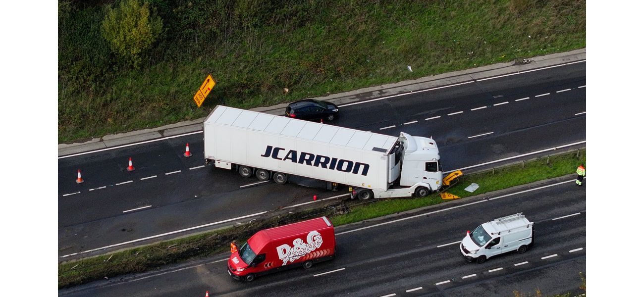A truck's jackknifing on a dual carriageway leads to major traffic delays.