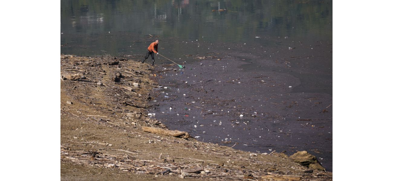 Lake ruined by tons of trash.
