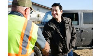 Ex-cop Gabe Evans runs for Congress, navigating Trump controversy.