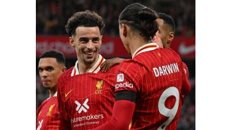 Liverpool's Arne Slot commends Curtis Jones for his effective defense against Chelsea's Cole Palmer in the team's recent win.