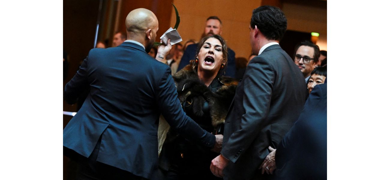King Charles was criticized as a 'genocidalist' by an Australian Senator during a public event.
