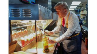 Trump trolls Harris by working at Mickey D's drive-through