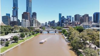 Two people taken into custody following the death of a man who drowned in the Yarra River in Melbourne.