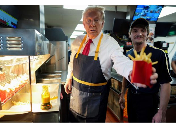 Trump multitasks by doing a shift at a McDonald's and giving a press conference at the drive-thru in Pennsylvania.