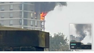 Massive fire in east London building, 70 firefighters working to put it out.