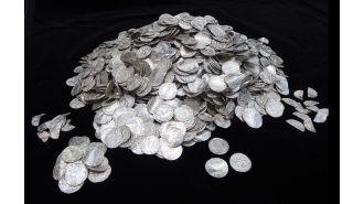 A group of seven treasure seekers discover ancient coins and make £4,300,000 by selling them.