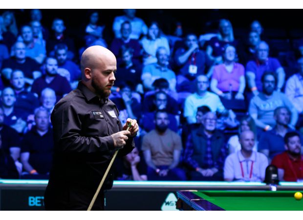 Professional snooker player Luca Brecel is continuing his unconventional training methods at the Northern Ireland Open.