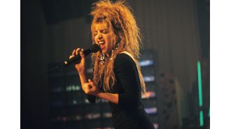 62-year-old pop star defies age with youthful appearance and continues to make hits after 36 years.