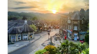 Visitors enjoy a relaxed atmosphere, enchanting vibes, and beautiful views in this charming British town.