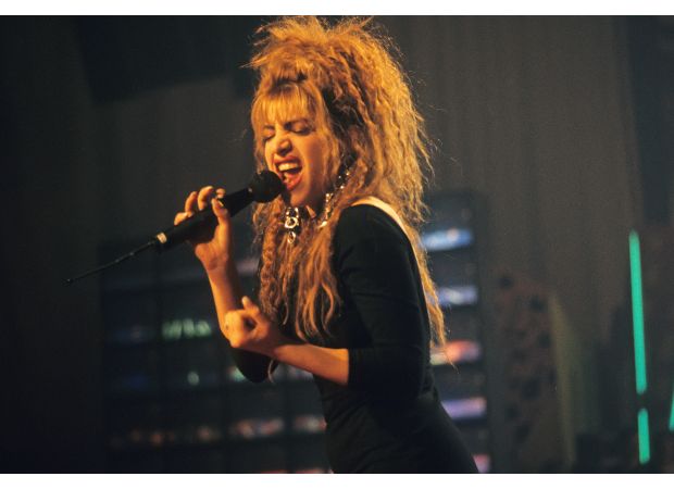 62-year-old pop star defies age with youthful appearance and continues to make hits after 36 years.