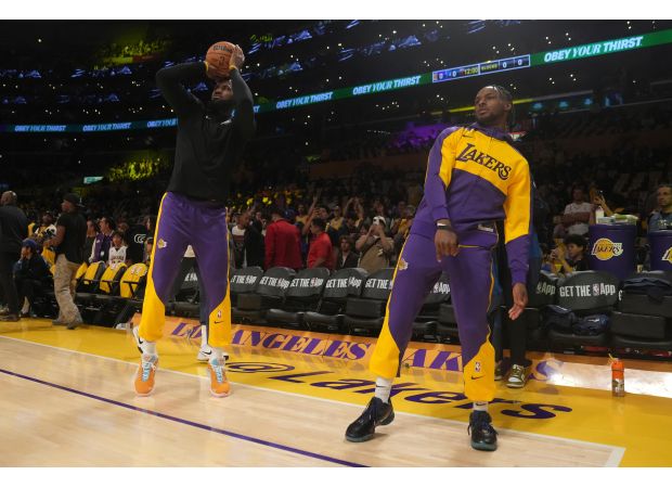 LeBron and his son Bronny create a new record as the first father-son pair in the NBA to play on the same team.