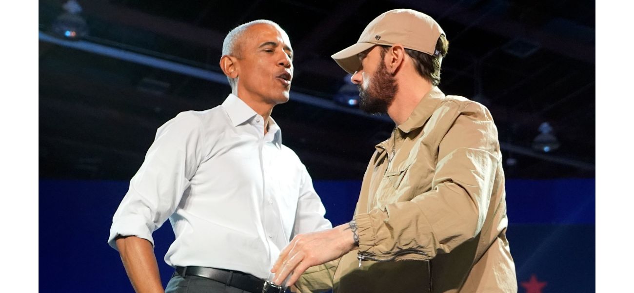 Former president Obama joins Eminem on stage, rapping along to his popular 2000s hit.