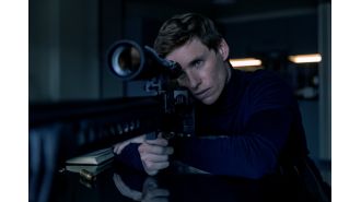 Eddie Redmayne responds to James Bond comparisons in 70s reboot with just two words.