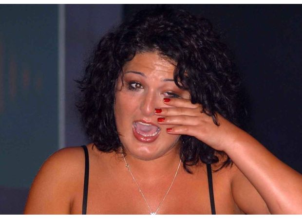 '20 years after winning Big Brother, this contestant looks completely different as she showers in a bikini and shows off her six-stone weight loss.'