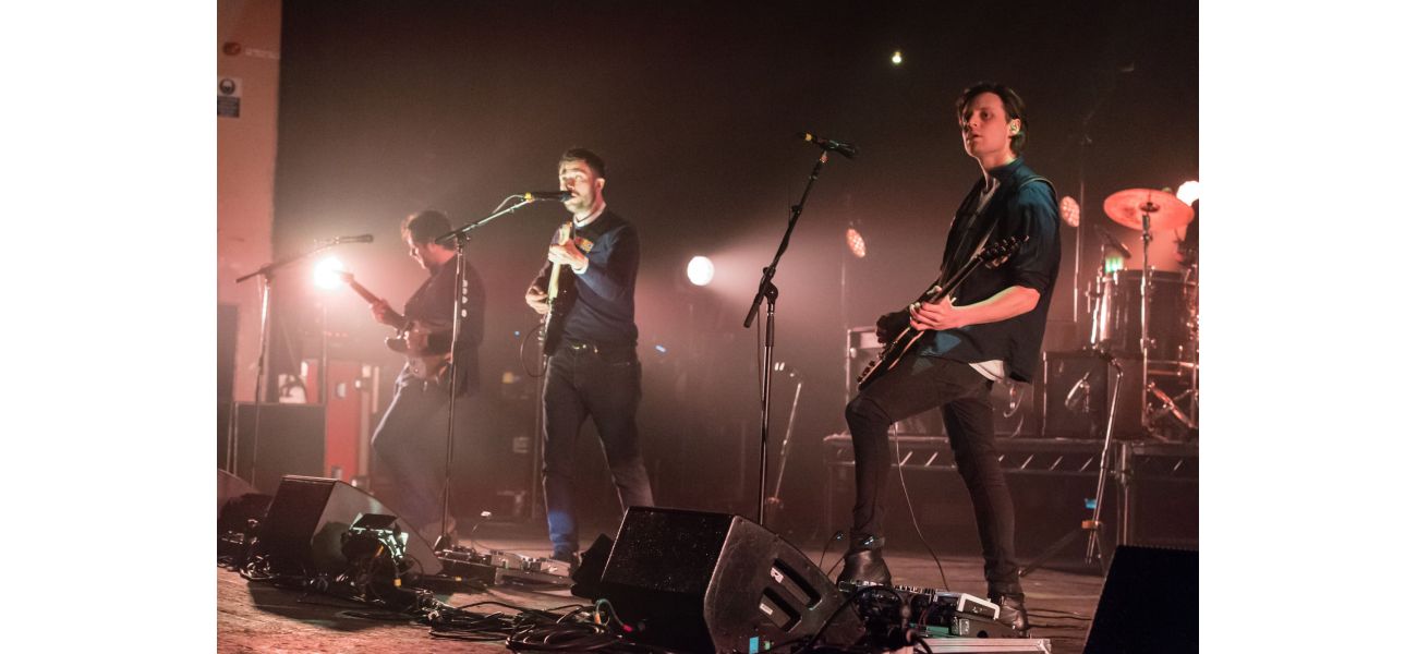 Excited fans speculate about a possible reunion for a popular band from the 2000s after 8 years of being apart.