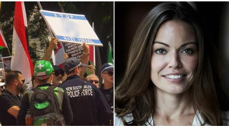 A woman kicks her husband out of their business following his involvement in a protest with a sign.