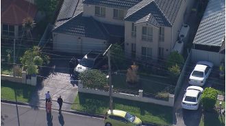 Man taken into custody following fatal stabbing in house near the suburbs.