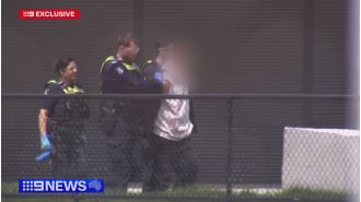 Suspect accused of murder after discovery of deceased pharmacist in Melbourne residence.