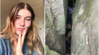 Woman thanks rescuers after being rescued from a boulder, known as 