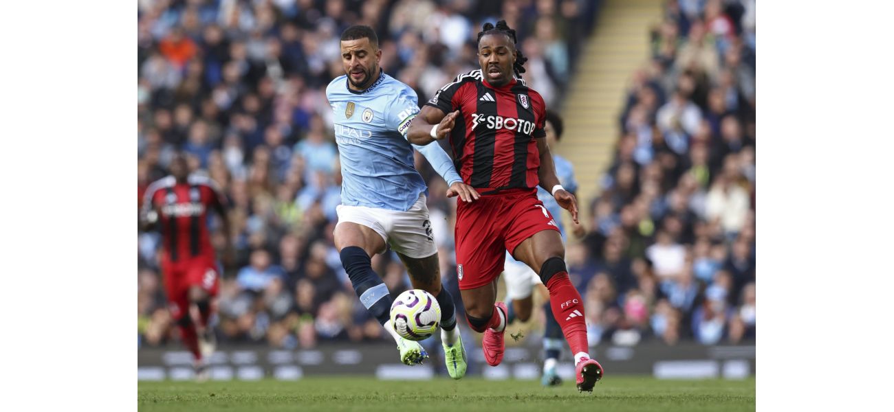 Kyle Walker reaches out to Adama Traore after being defeated in a sprint race.