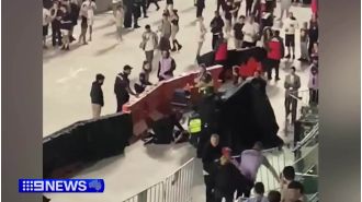 A fan of Travis Scott experienced a seizure during his concert in Melbourne after a confrontation with security.