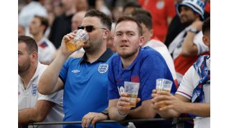 Possible paraphrase: UK soccer games will experiment with allowing alcohol consumption in the stands.