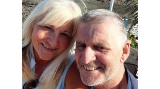 Married couple separated beds on honeymoon.