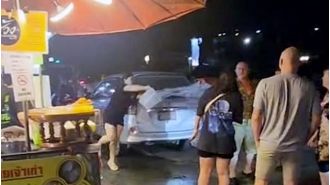 A British tourist learns a lesson after lighting a cigarette near gas bottles.