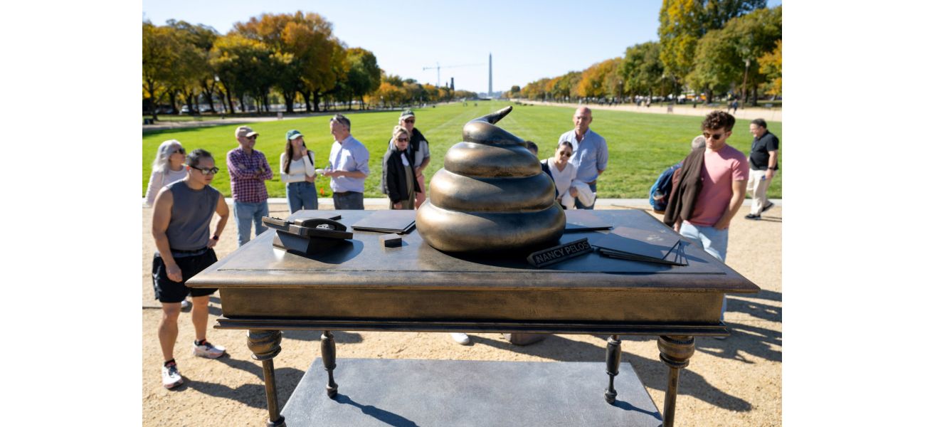 A turd statue appears at the January 6 location to honor the 
