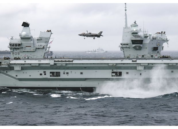 UK's largest warship joins US ship for massive war exercises in waters near British coast.