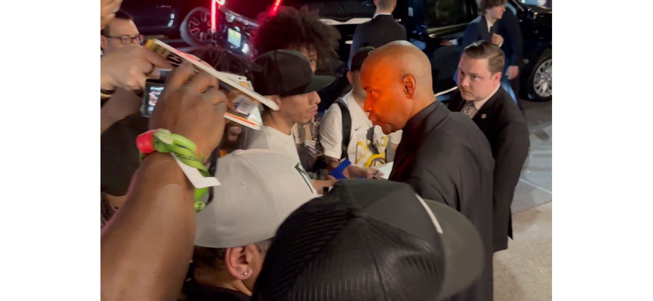 Denzel Washington confronts autograph hunters, asserting his need for respect in a heated argument.
