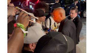 Denzel Washington confronts autograph hunters, asserting his need for respect in a heated argument.