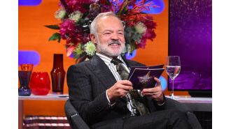 Graham Norton admits he is willing to betray certain celebrities while on tour.