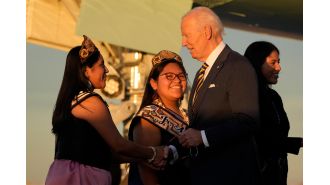 Biden apologizes to Indigenous communities for 150-year boarding school policy during visit to Indian Country.