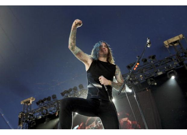 Following conviction of hitman hiring, controversial band's 3 members abruptly leave.