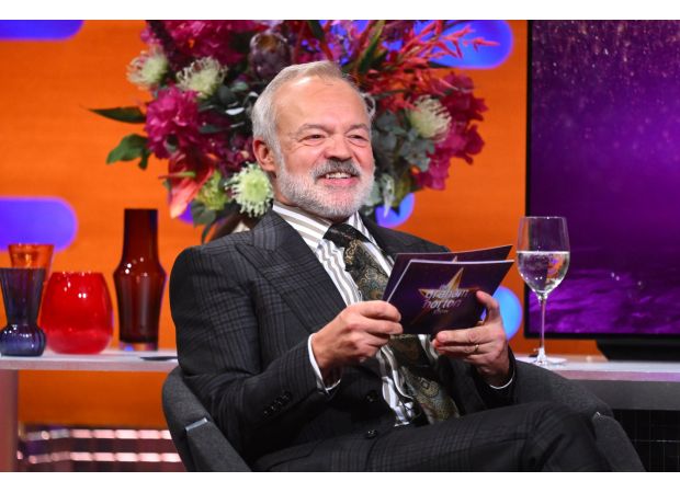 Graham Norton admits he is willing to betray certain celebrities while on tour.