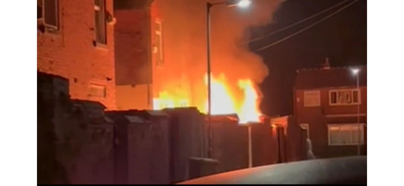 A fire destroys a house after vandals throw fireworks into their backyard, causing damage.