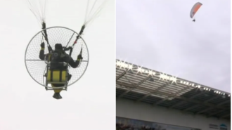The championship game is paused due to an unidentified person flying over the stadium.