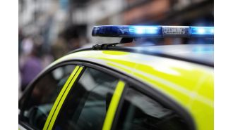A motorist's jaw is fractured in a robbery by impostor officers during a traffic stop.