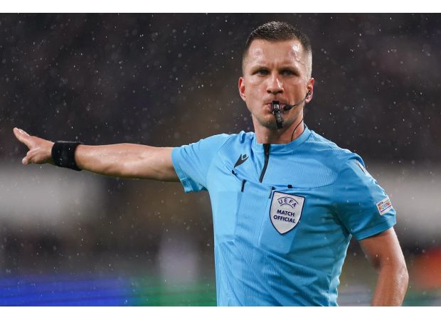 UEFA bans two referees for stealing road sign while drunk before a Champions League match.