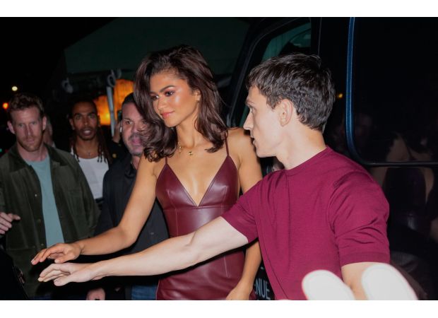Tom Holland is like a real-life Spider-Man, protecting his girlfriend Zendaya on a night out.