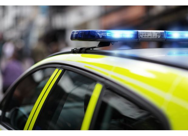 A motorist's jaw is fractured in a robbery by impostor officers during a traffic stop.