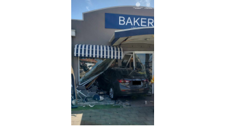 Injured customer in car crash at bakery south of Adelaide.