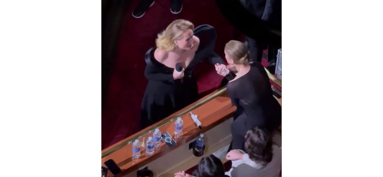 Adele is moved to tears when her music idol unexpectedly appears during her performance.