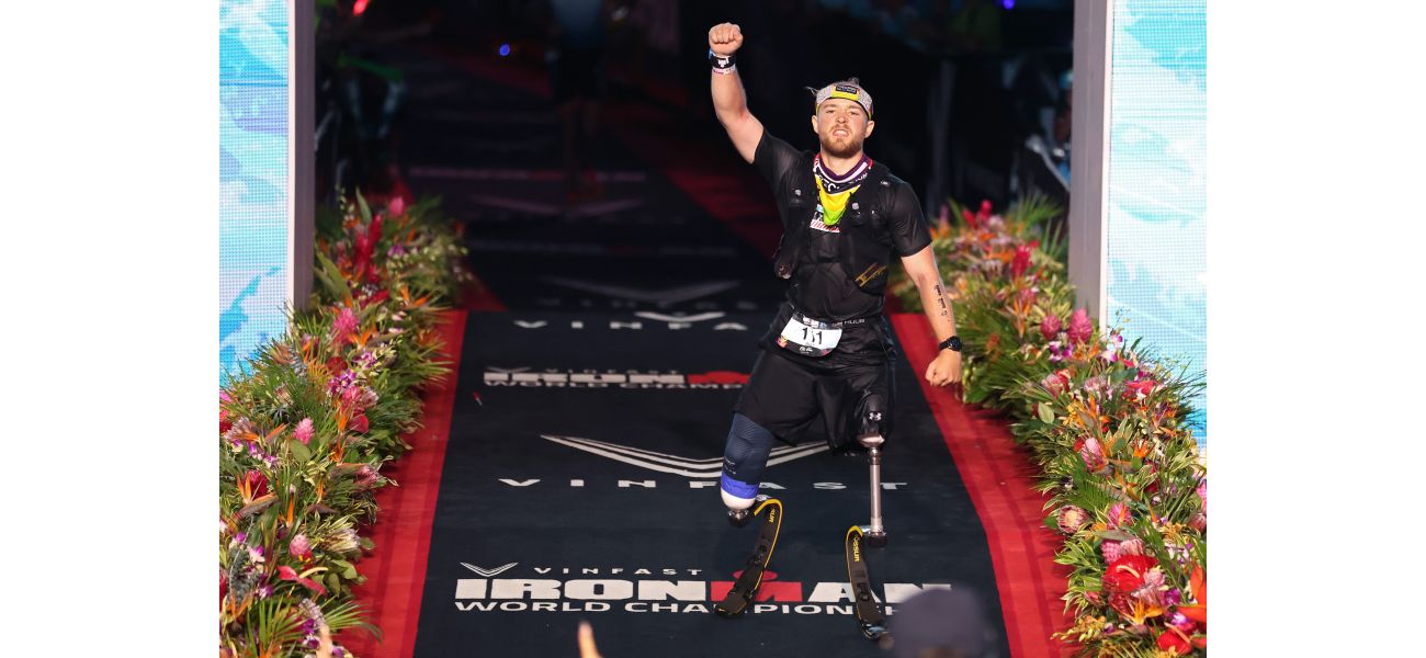 Billy Monger, a double amputee, sets new Ironman World Championship record despite being stung by a jellyfish.