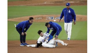 Ohtani injured shoulder in Game 2, uncertain if he can continue.